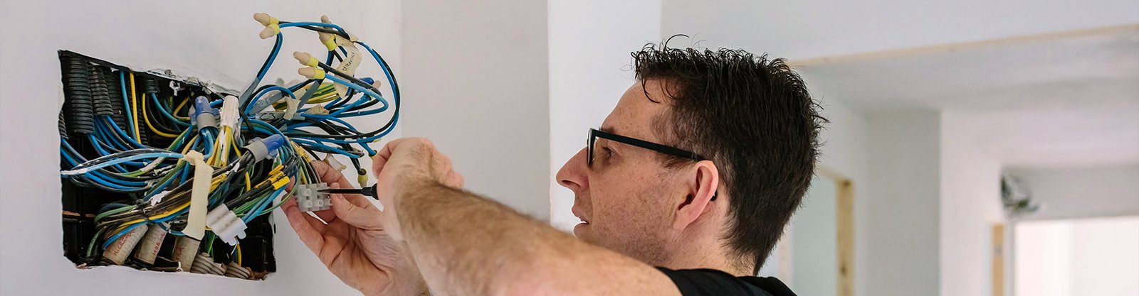 What are the Benefits of Hiring an Electrician for Home Rewiring?